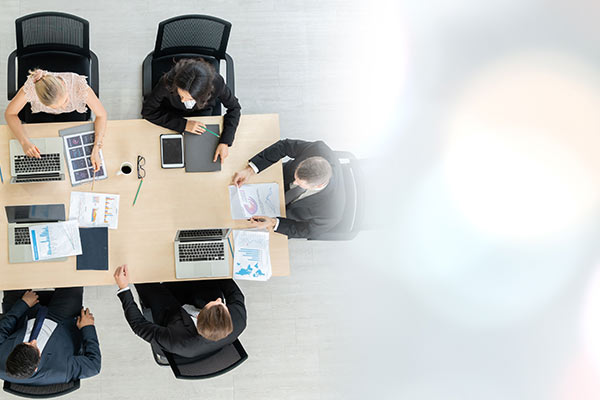 several professionals conducting a private meeting